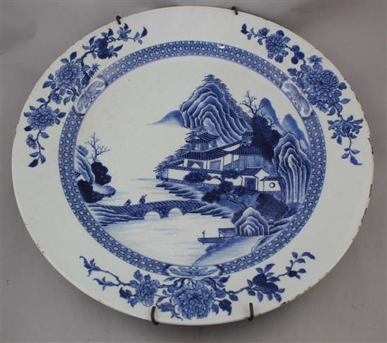 A large Chinese export blue and white dish, Qianlong period, 42.5cm., slight damage